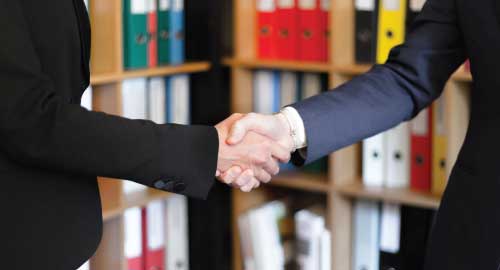 People shaking hands.